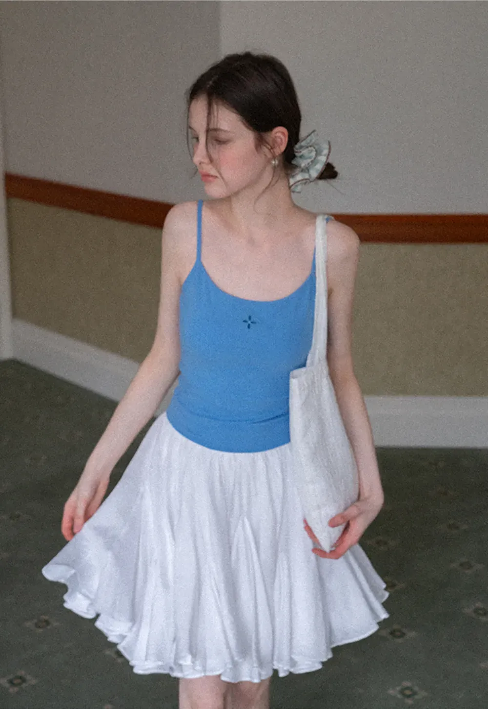 Gray tank top with small embroidered cross detail