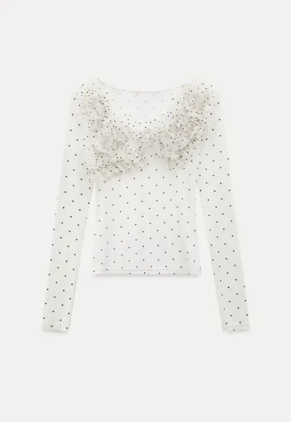Polka dot long sleeve top with ruffled neckline