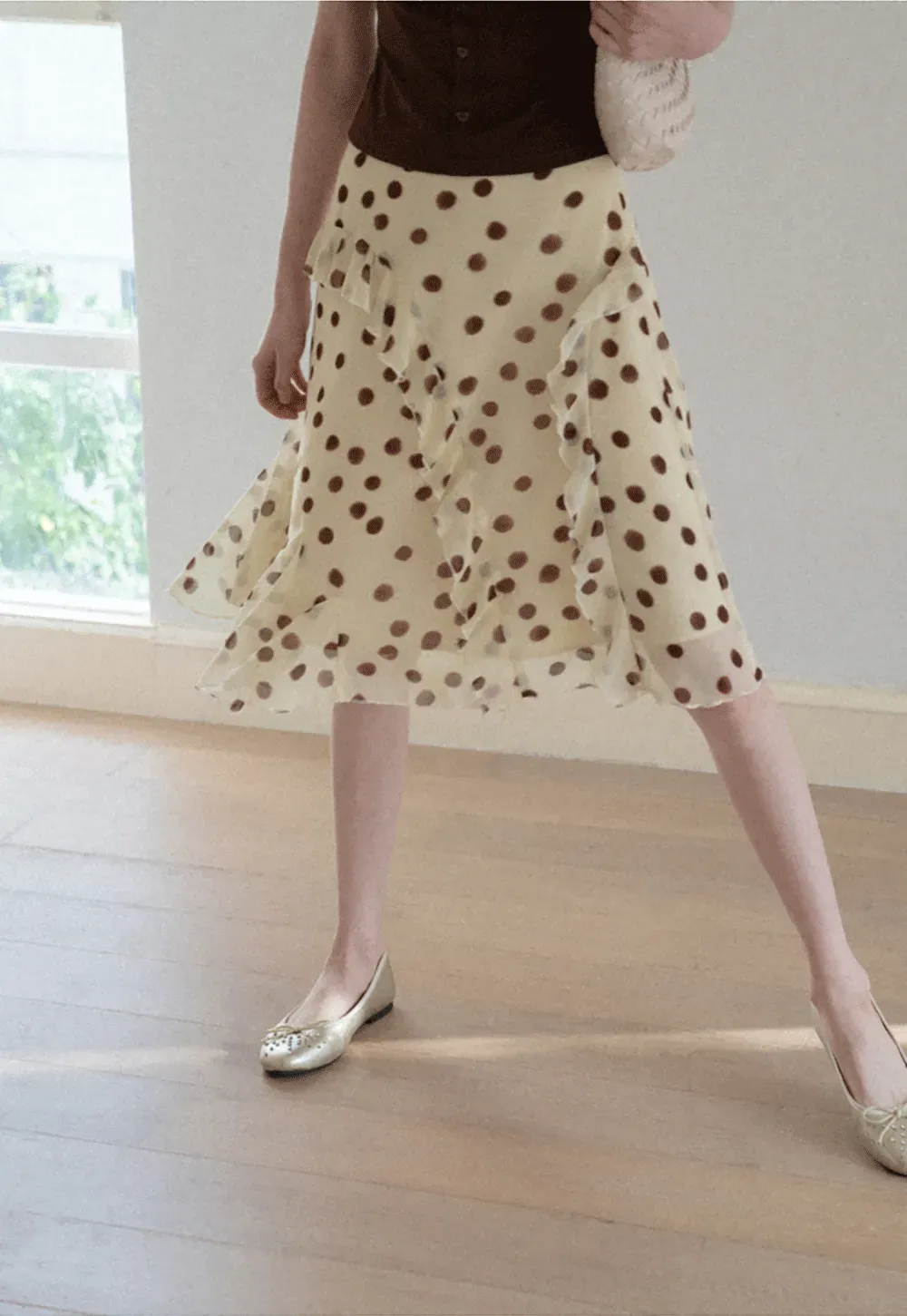 Polka dot ruffled asymmetrical midi skirt