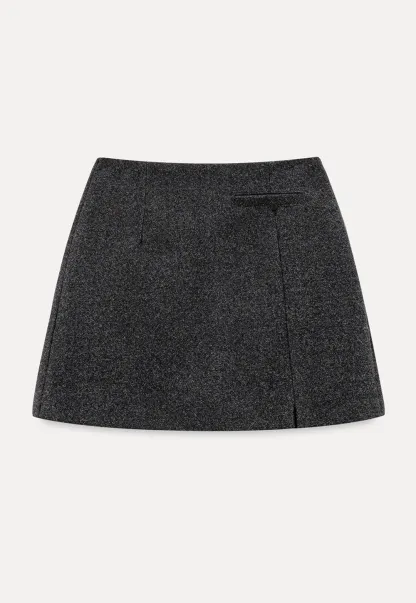 A-line mini skirt with textured fabric and central seam design