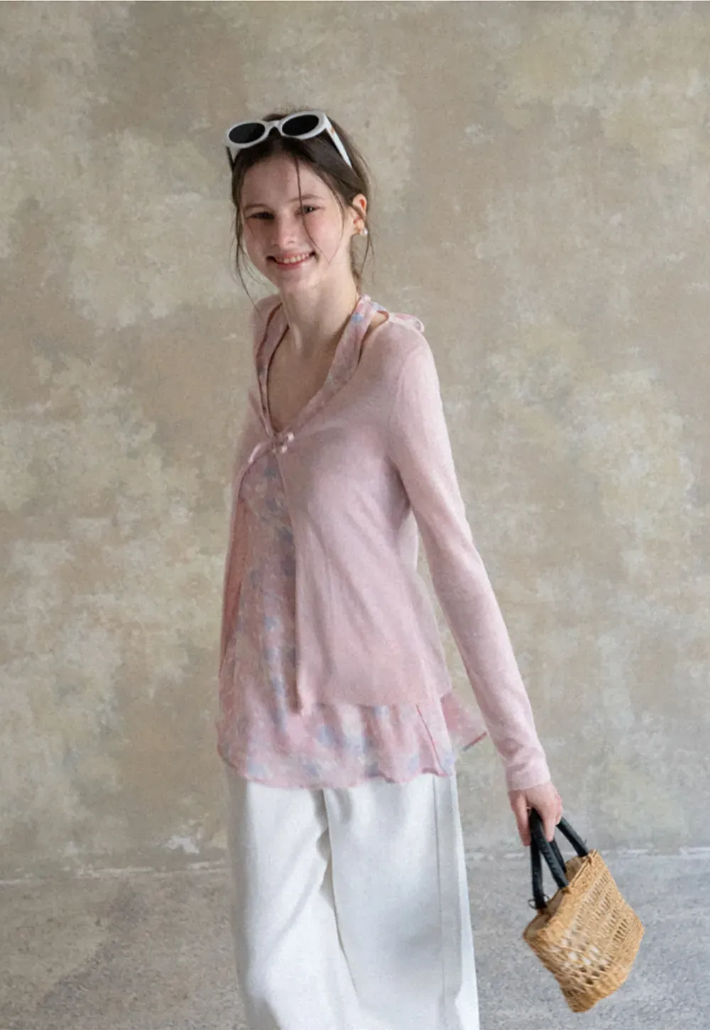 Woolen knit sweater with tie front and floral tank top