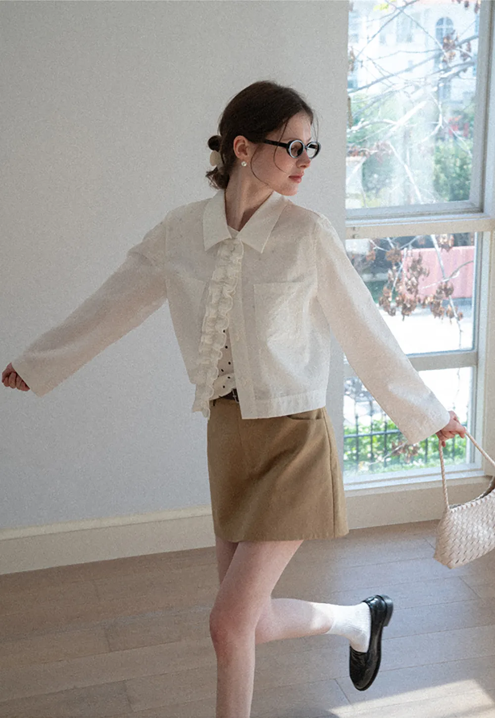 Short jacket with ruffled front placket and collar