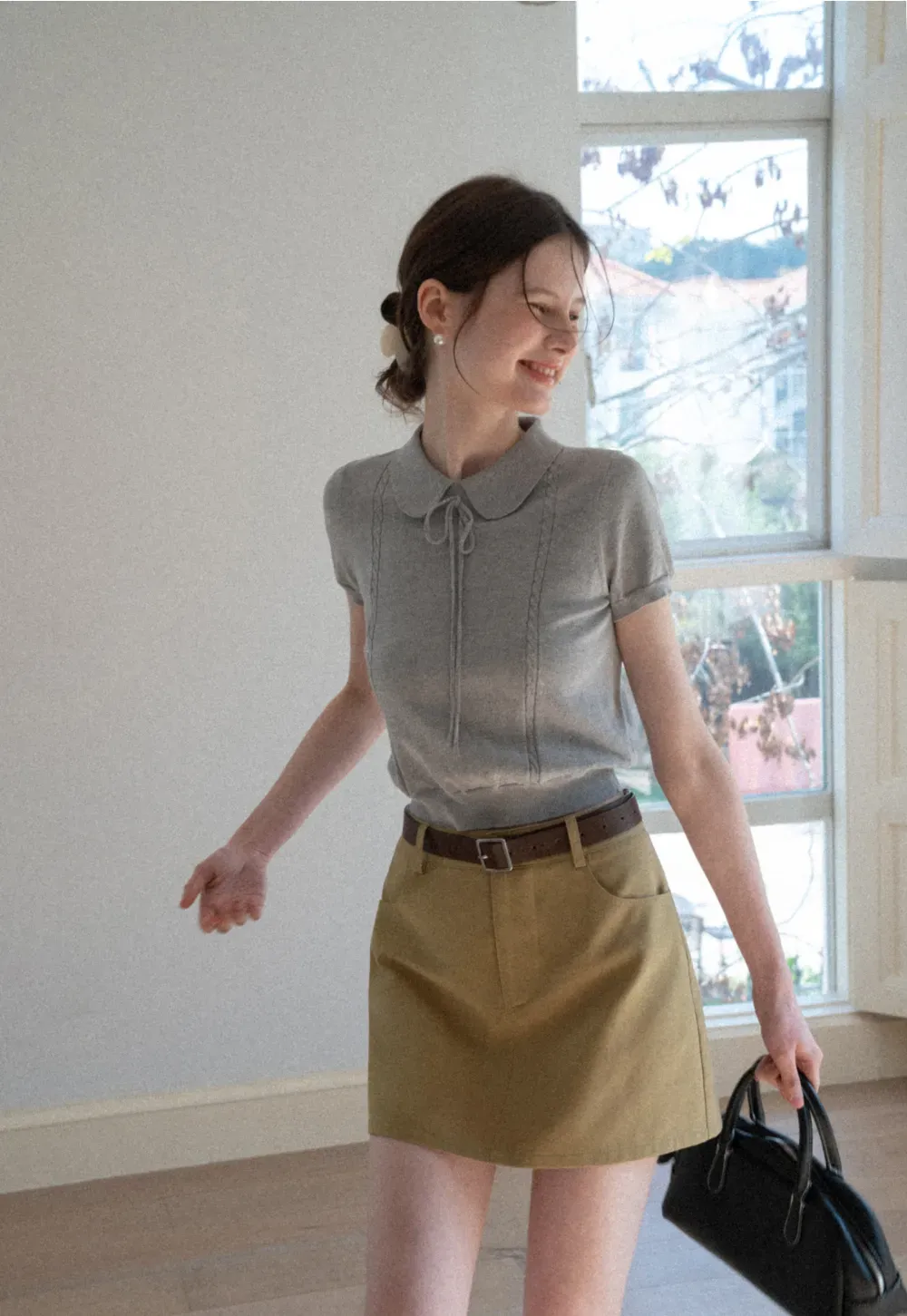 A-line mini skirt with front pockets and belt loops