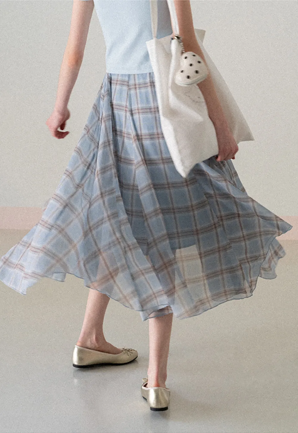 Pleated Plaid Midi Skirt with Asymmetrical Hem