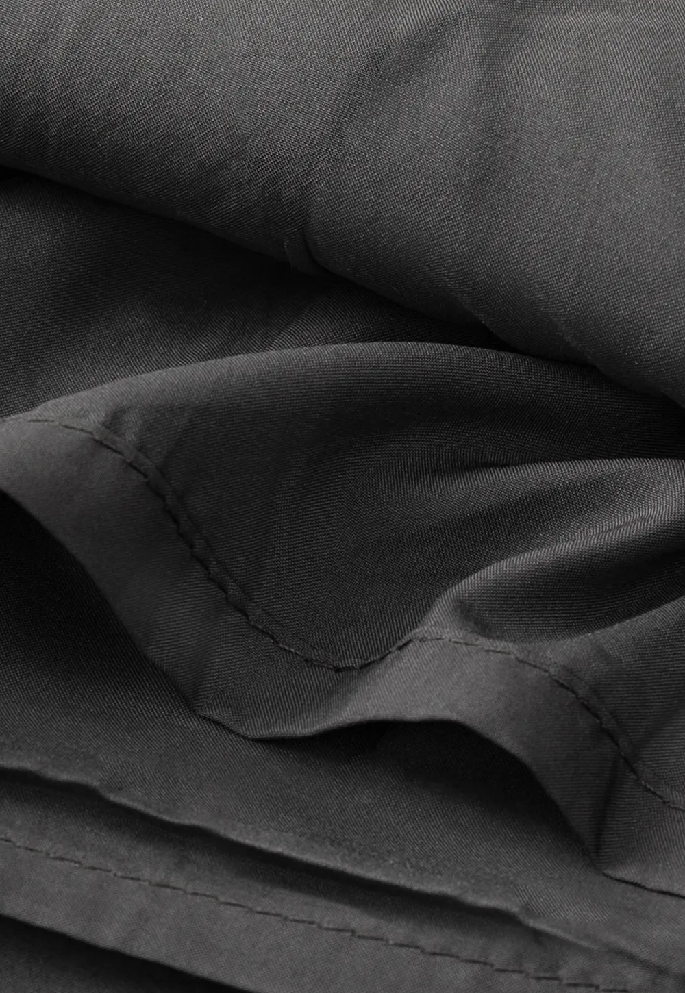 A-line mini skirt with textured fabric and central seam design