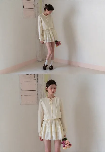 Shirt with ruffled collar and tie front layered skirt