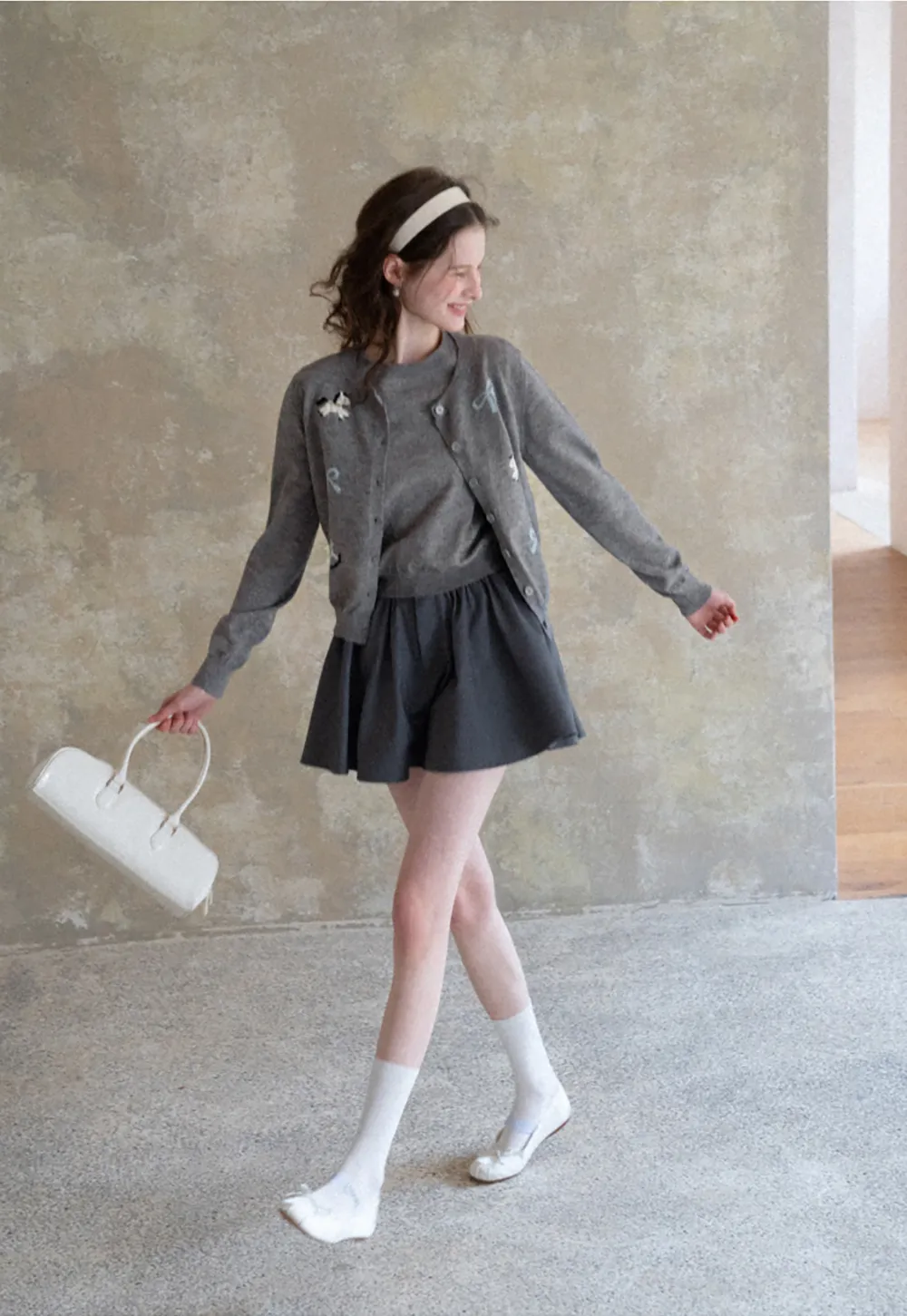 Woolen knit sweater with horse and bow motifs