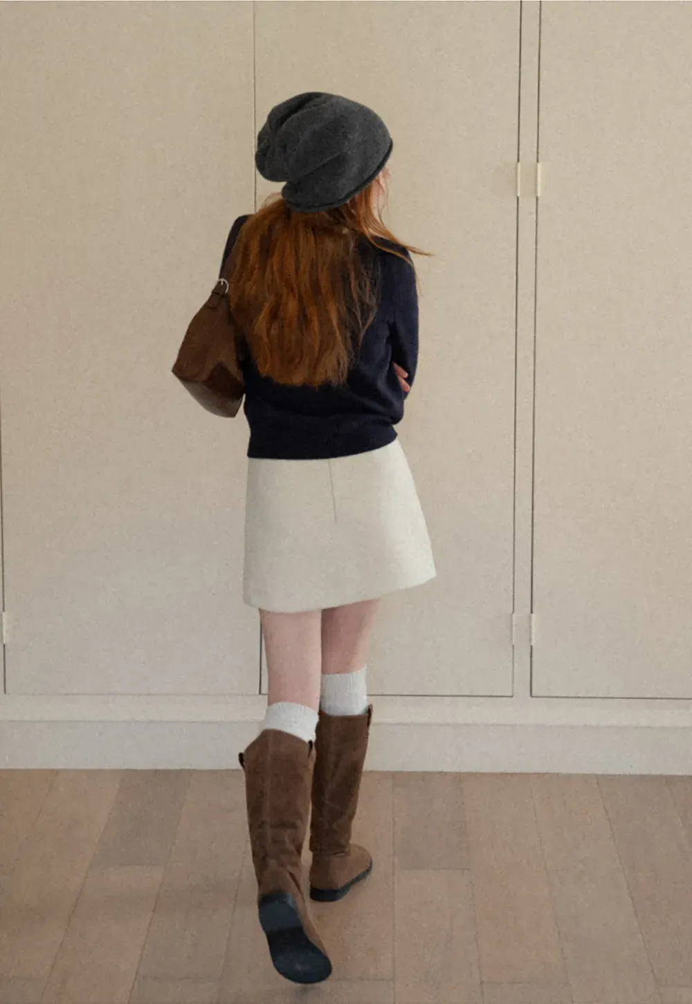 A-line mini skirt with textured fabric and central seam design