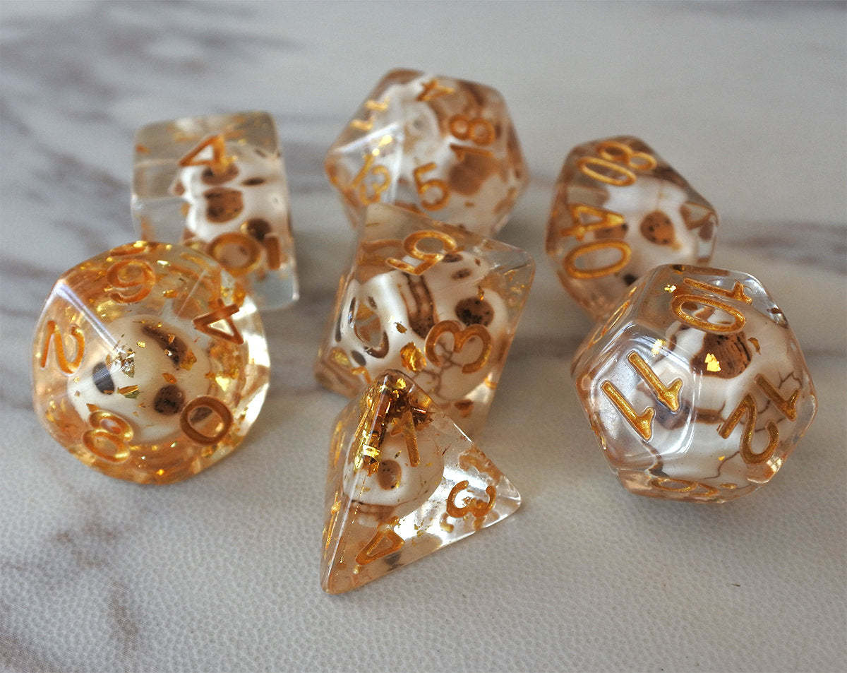 Skulls Laying in Golden Treasure Dice Set