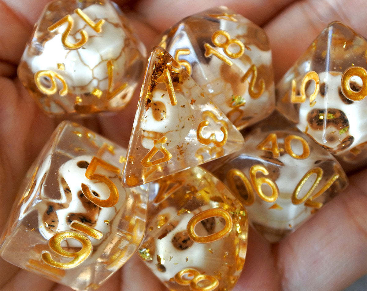 Skulls Laying in Golden Treasure Dice Set