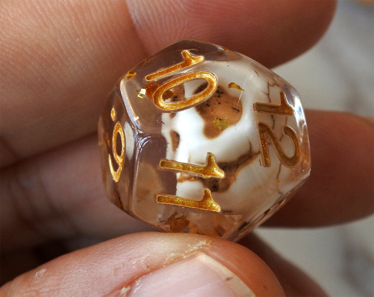 Skulls Laying in Golden Treasure Dice Set