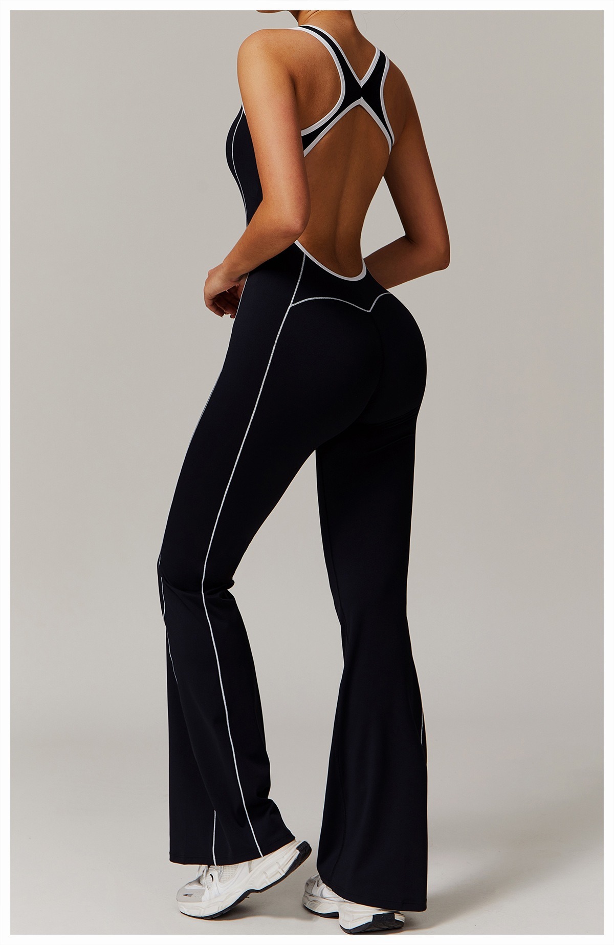 Vibecurve® Cutout Back Contrast Piping Flare Jumpsuit