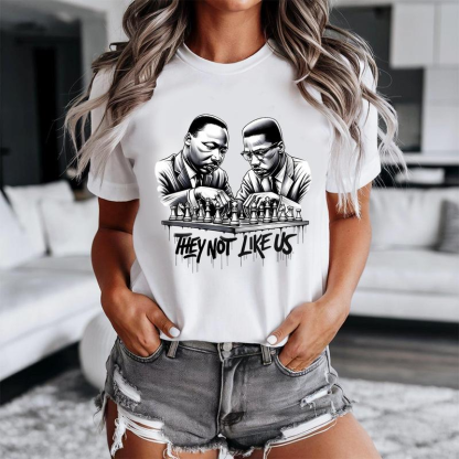 They Not Like Us T-Shirt-MLK & Malcolm X Chess Graphic Tee for Black History & Culture