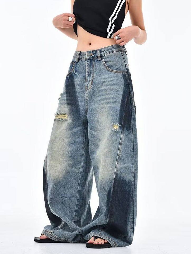Deconstructed Scythe-Hem Jeans with Spray-Painted Panels & Asymmetric Detailing