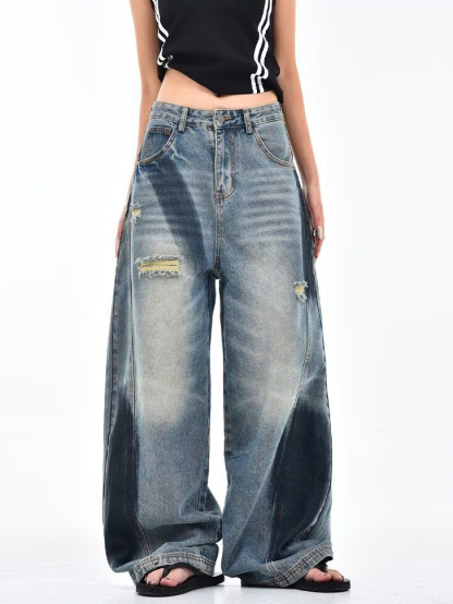 Deconstructed Scythe-Hem Jeans with Spray-Painted Panels & Asymmetric Detailing