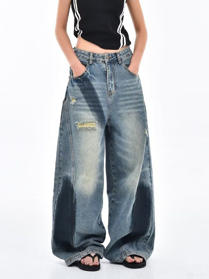 Deconstructed Scythe-Hem Jeans with Spray-Painted Panels & Asymmetric Detailing