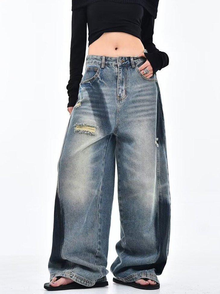 Deconstructed Scythe-Hem Jeans with Spray-Painted Panels & Asymmetric Detailing