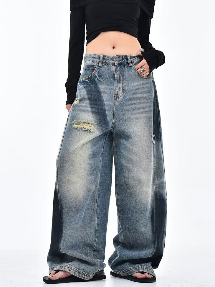 Deconstructed Scythe-Hem Jeans with Spray-Painted Panels & Asymmetric Detailing