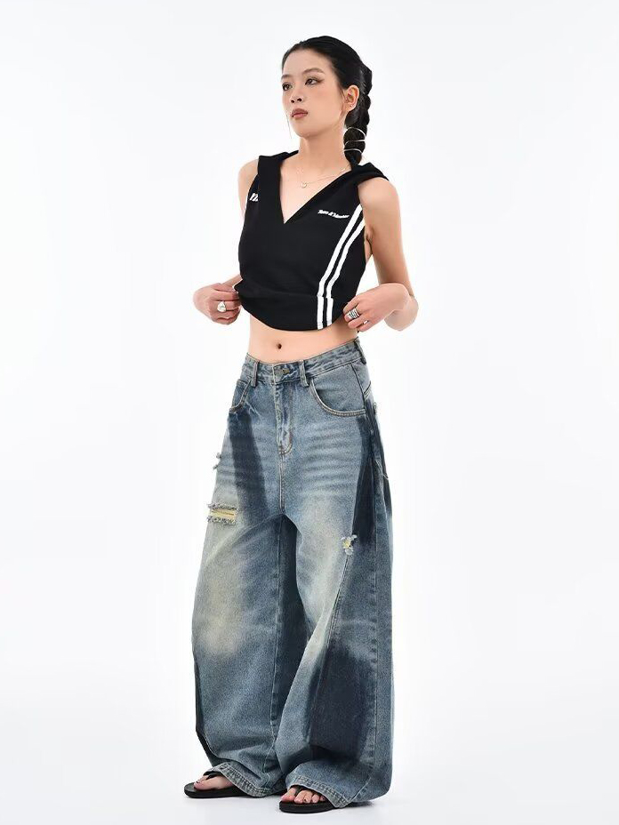 Deconstructed Scythe-Hem Jeans with Spray-Painted Panels & Asymmetric Detailing