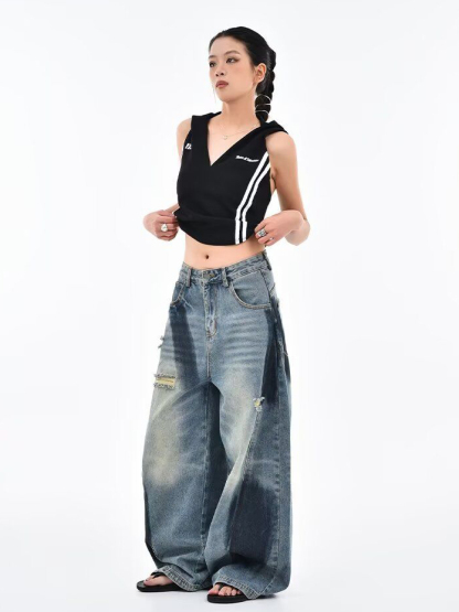 Deconstructed Scythe-Hem Jeans with Spray-Painted Panels & Asymmetric Detailing