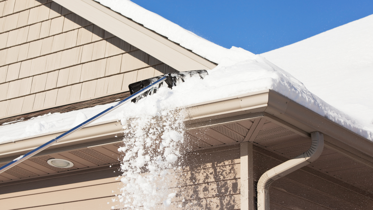 roof rake to clear snow safely