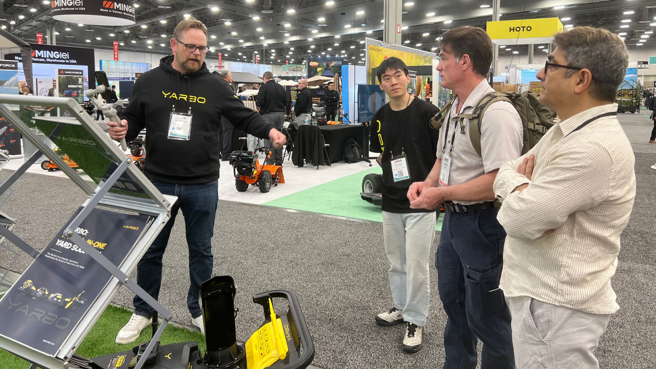 Guests at NHS talking to Yarbo's team