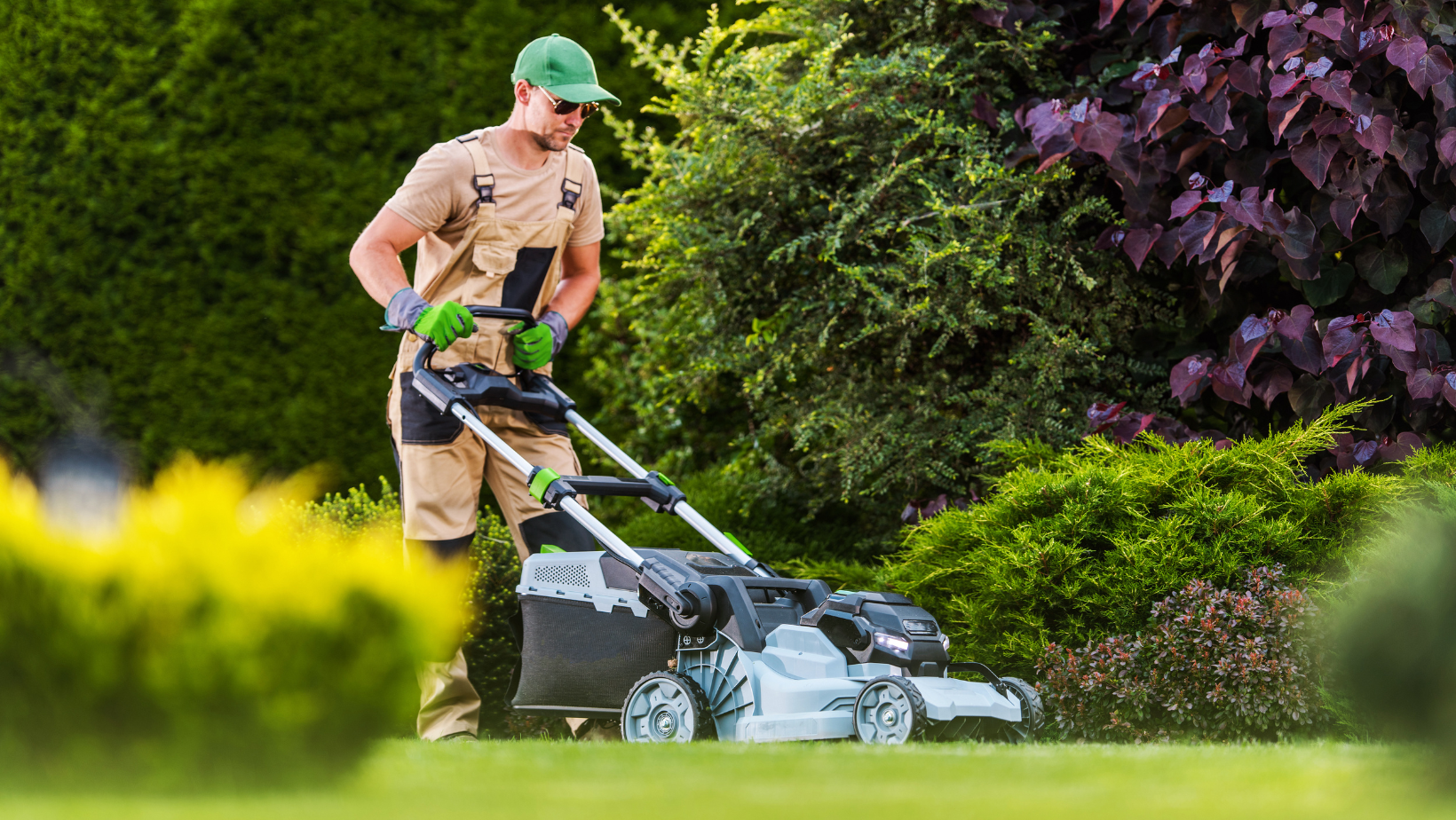Man using a push mower