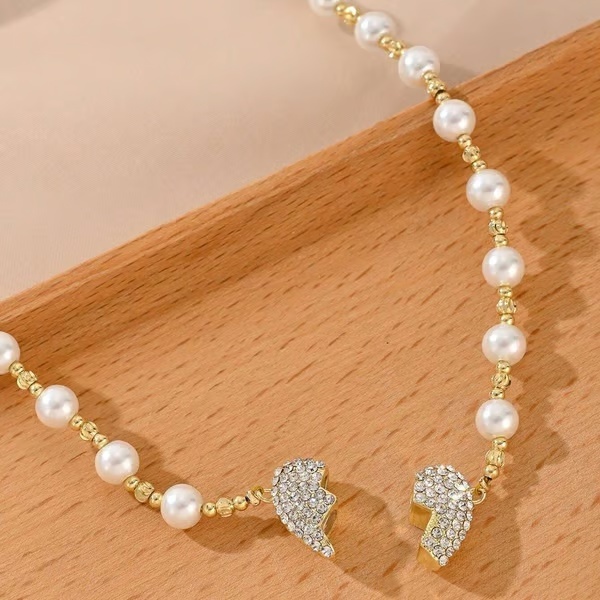 📿Nuova collana magnetica a forma di cuore con perle
