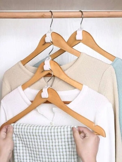 Ganci di collegamento per grucce salvaspazio