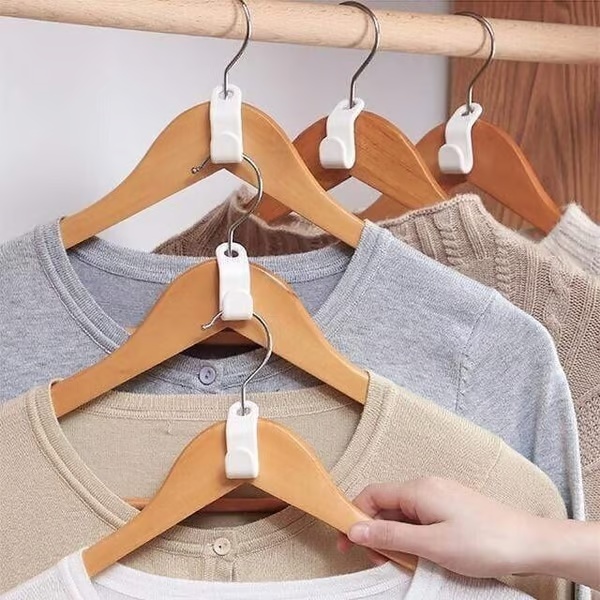 Ganci di collegamento per grucce salvaspazio