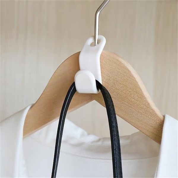 Ganci di collegamento per grucce salvaspazio