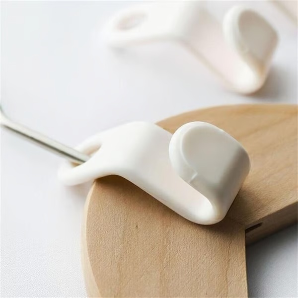Ganci di collegamento per grucce salvaspazio