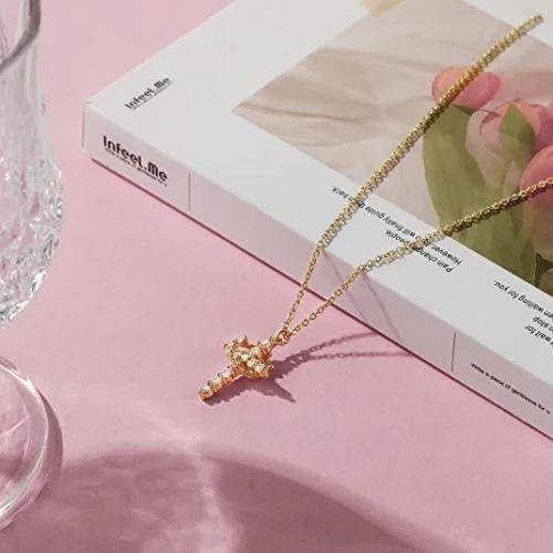 Collana con corona rotante a croce pavé