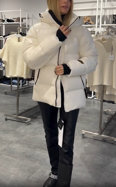 Thick hooded down jacket with built-in shoulder straps