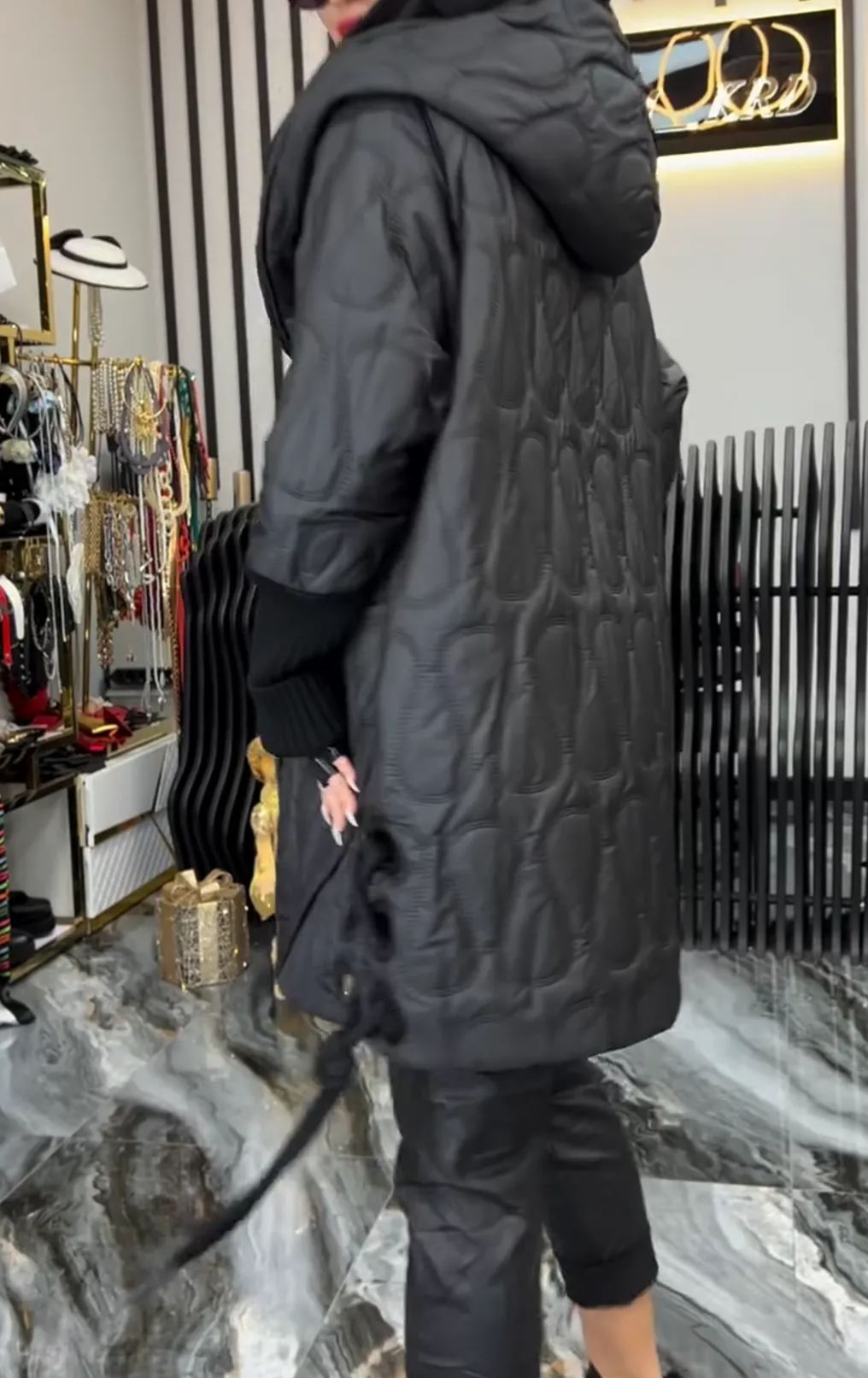Black Quilted Hooded Coat with Unique Pattern