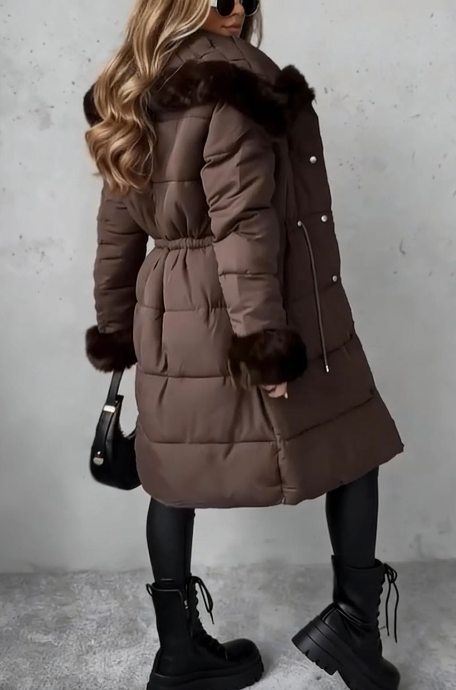 Mid-length down jacket with hood, accented with faux fur trim