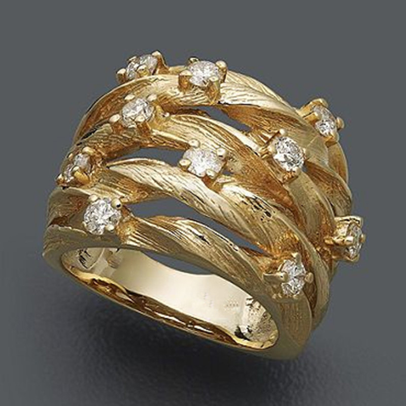 Golden ring with entwined vines