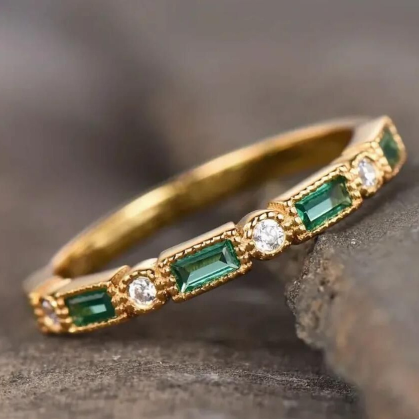 Petite ring set with emerald zircon