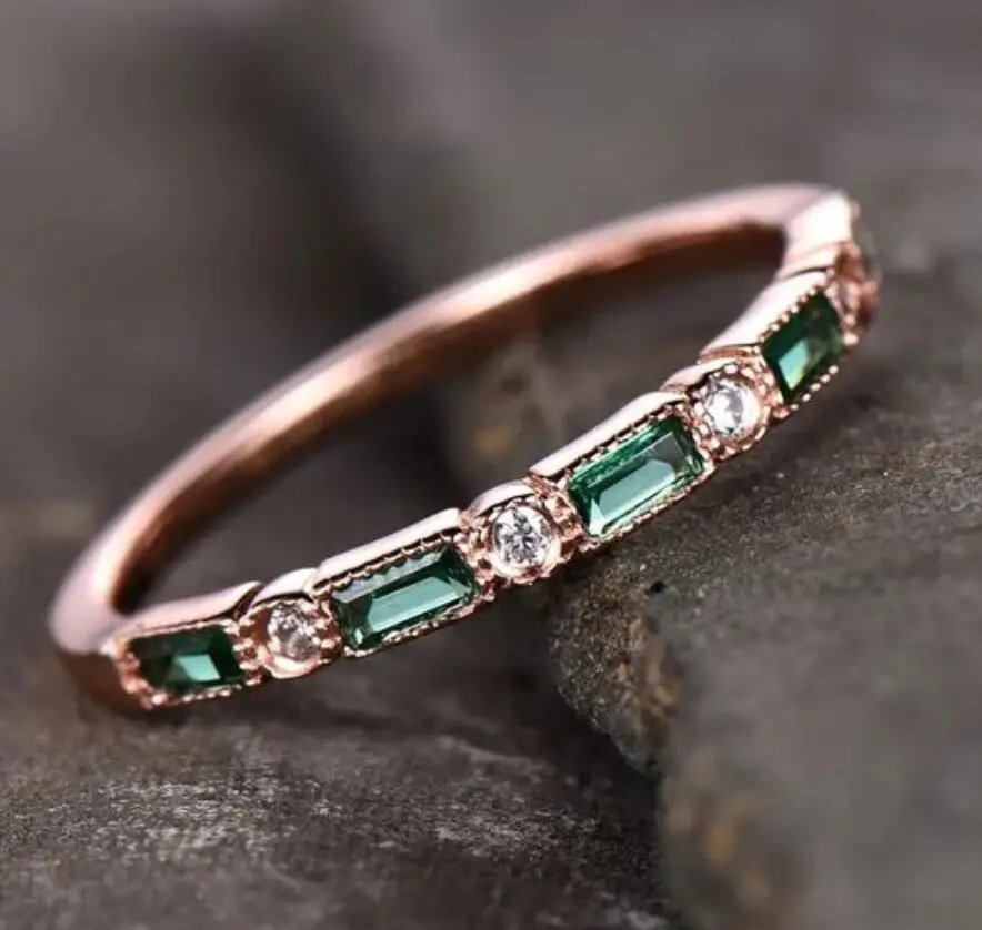 Petite ring set with emerald zircon