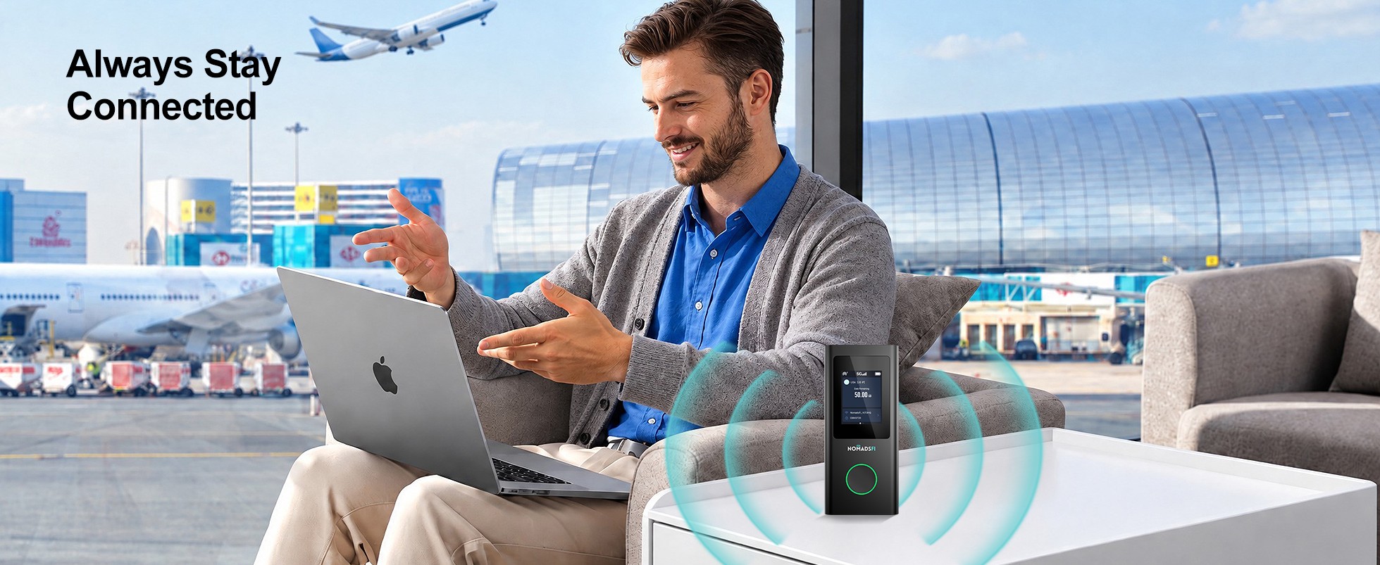 Business traveler using a laptop beside a NomadsFi hotspot in an airport lounge