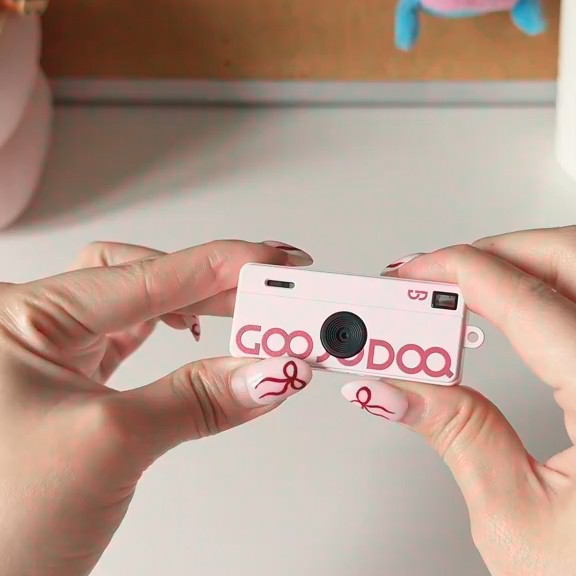 Pocket-Sized Nostalgia: Blush Pink Vintage Micro Camera