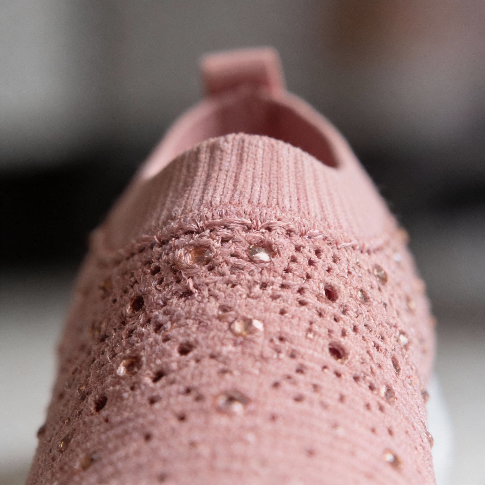 Stylish shot of sneakers paired with a casual-chic outfit