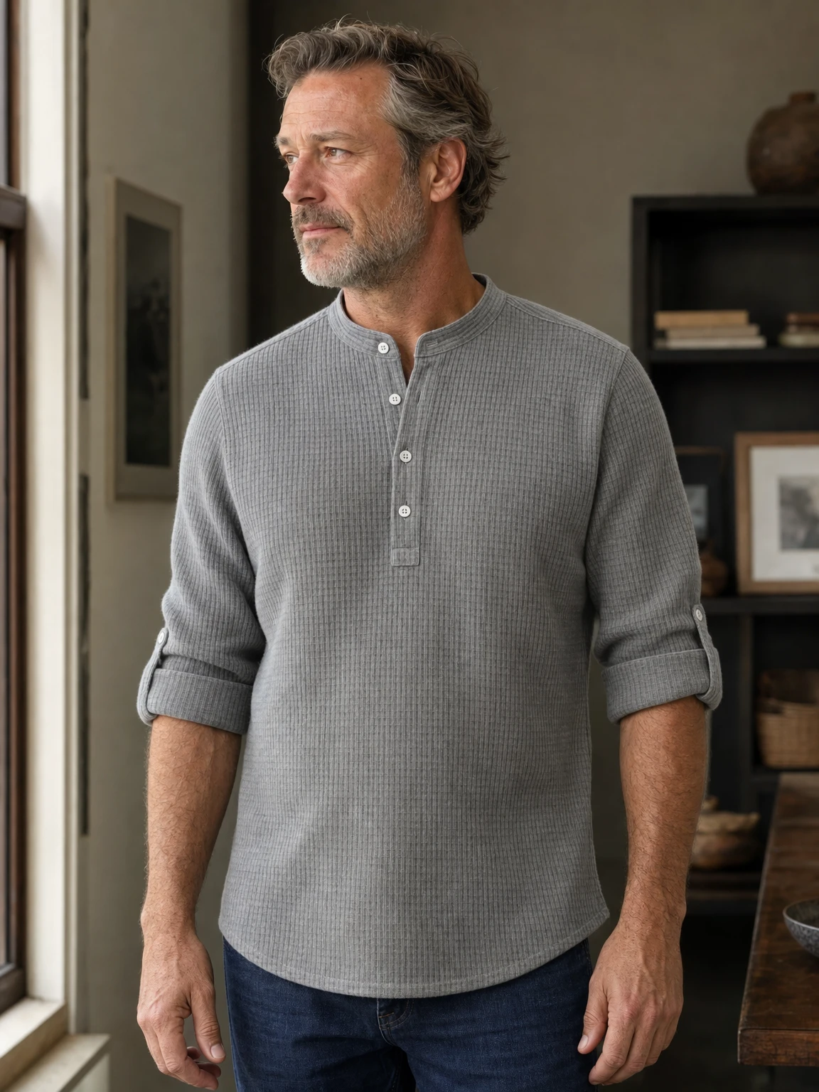 Mature American male model wearing the gray Porto Henley indoors