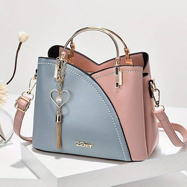 Women's Navy Blue and Pink Handbag with Heart Tassel Charm – Elegant Faux Leather Crossbody and Tote Bag for Everyday Use