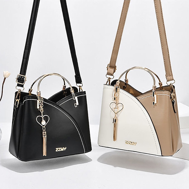 Women's Navy Blue and Pink Handbag with Heart Tassel Charm – Elegant Faux Leather Crossbody and Tote Bag for Everyday Use