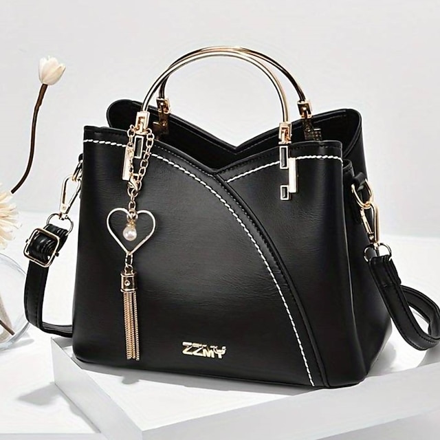 Women's Navy Blue and Pink Handbag with Heart Tassel Charm – Elegant Faux Leather Crossbody and Tote Bag for Everyday Use