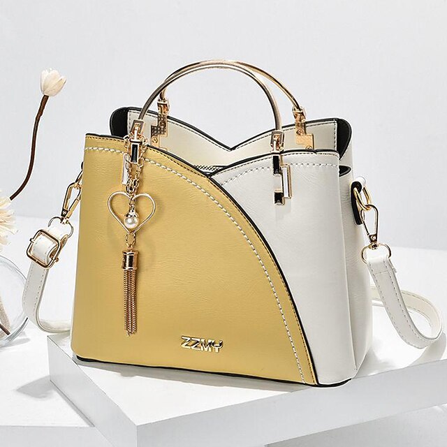 Women's Navy Blue and Pink Handbag with Heart Tassel Charm – Elegant Faux Leather Crossbody and Tote Bag for Everyday Use