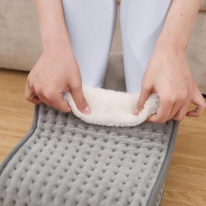Heated pad for winter foot warmer
