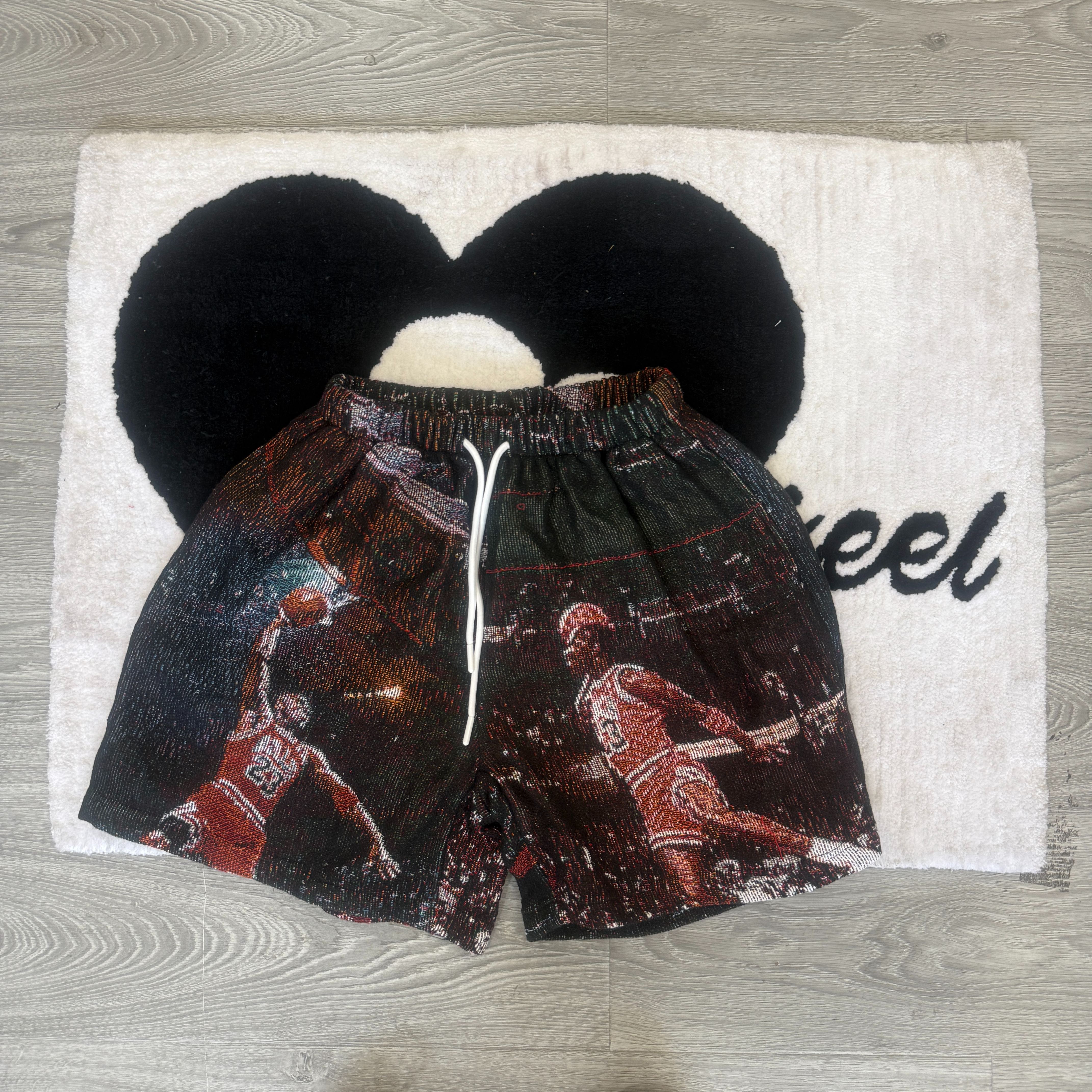 Channel the GOAT! Grab tapestryifeel's exclusive Michael Jordan shorts. Dominate the court & street in style. Comfortable, iconic, and a must-have for fans!