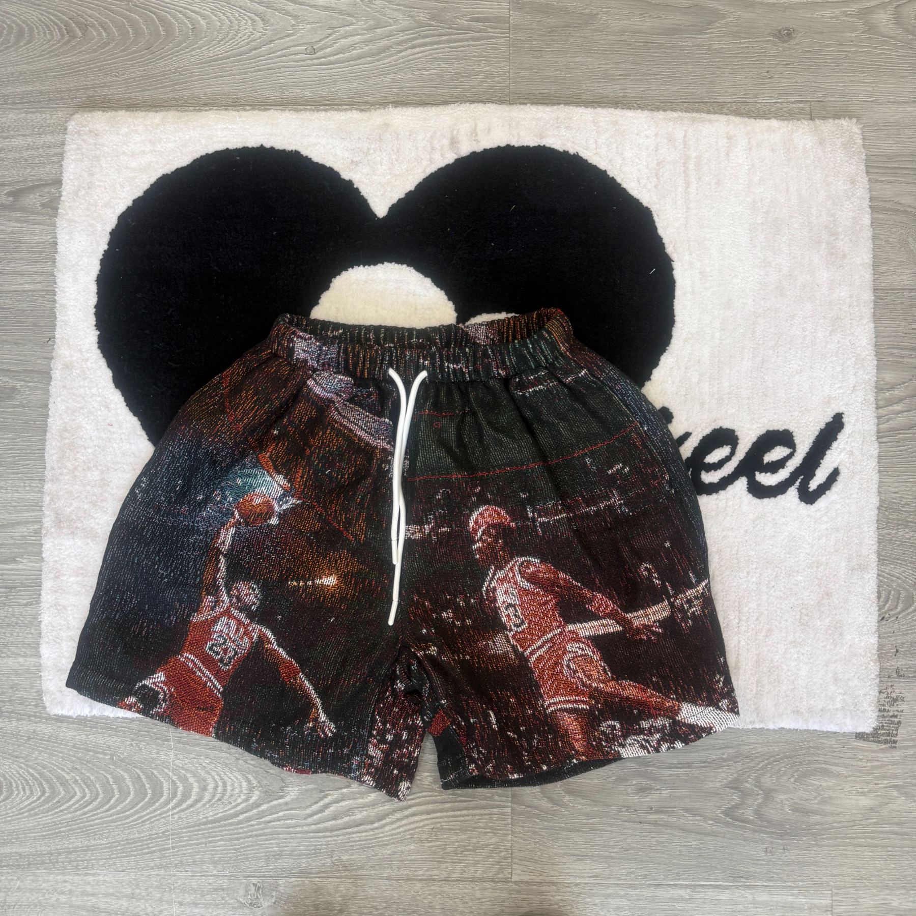 Channel the GOAT! Grab tapestryifeel's exclusive Michael Jordan shorts. Dominate the court & street in style. Comfortable, iconic, and a must-have for fans!